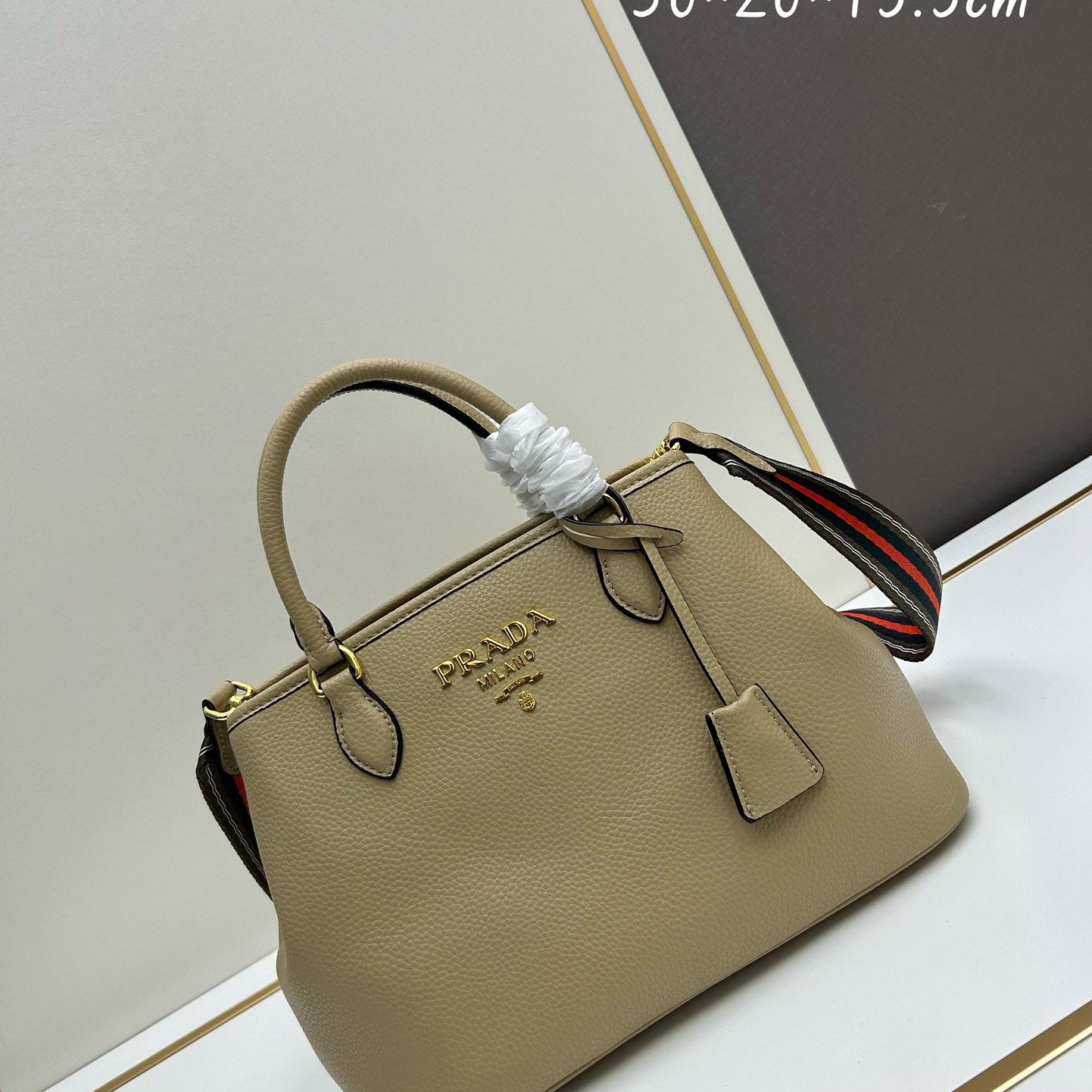 Pra*a top handle bags